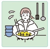 子どもがご飯を作っている